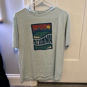 Men’s patagonia t-shirt.  Silky material.  Size M